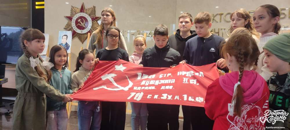 Участвовала в мероприятии по созданию знамении Победы